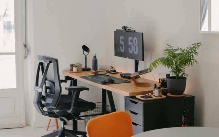 How are gaming and work setups influencing modern desk trends?